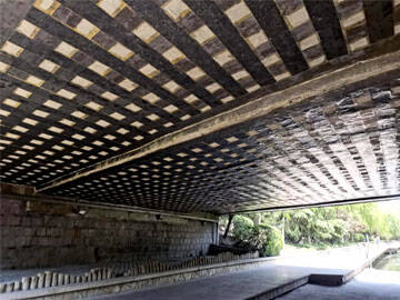 Strengthening of Concrete Bridges Using Fiber Reinforced Polymers (FRP)